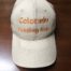 A beige ball cap hat with the words Colorado Feeding Kids on it